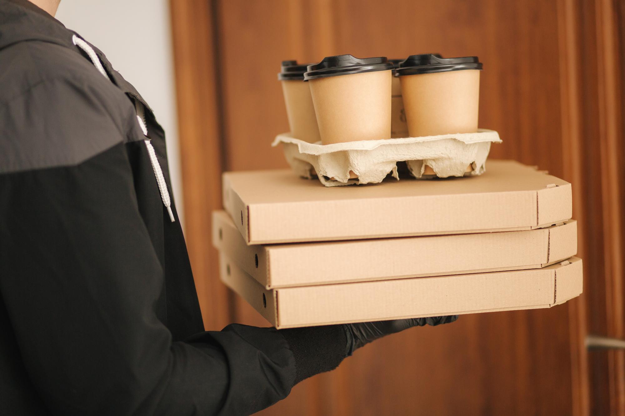 stack of prepared meal boxes for pickup